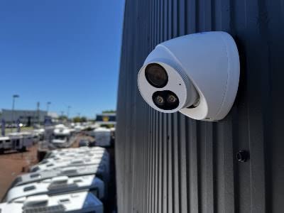 CCTV dome camera mounted on a building exterior